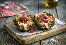 Alcachofas a la plancha en flor con jamón